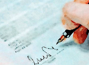 Hand with a pen signing a cover letter